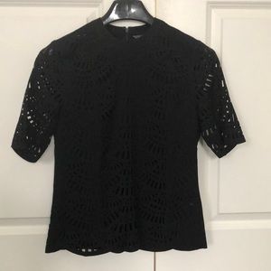 Laser cut stylish black top by Kenneth Cole size XS